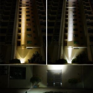 High-rise building facade showcasing vertical building uplighting using LED uplighter fixtures at night