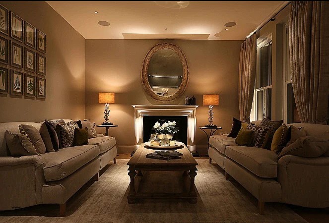 Layered lighting design showing ambient, task, and accent lighting in a living room